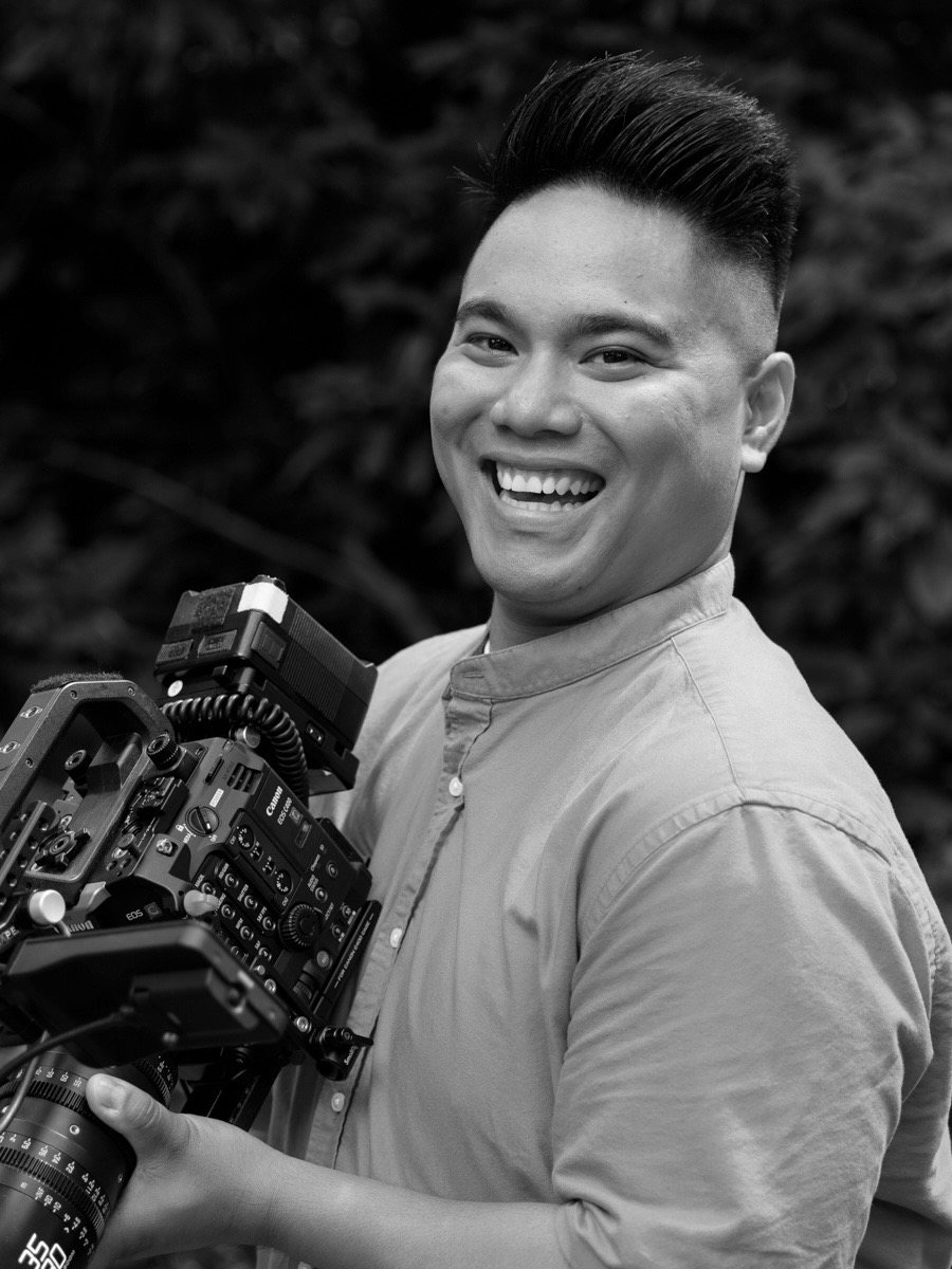 Taylon Nieto smiling, holding a cinema camera.